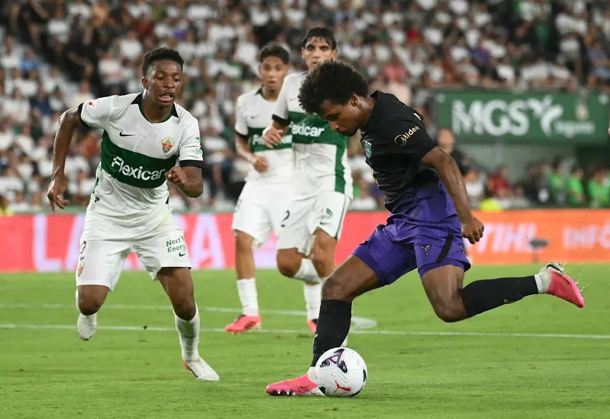 Player dribbling the ball during competitive match Player dribbling the ball during competitive match