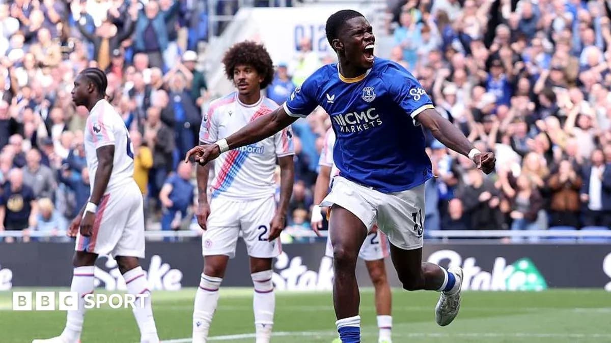 Player celebrating a goal during match at stadium Player celebrating a goal during match at stadium