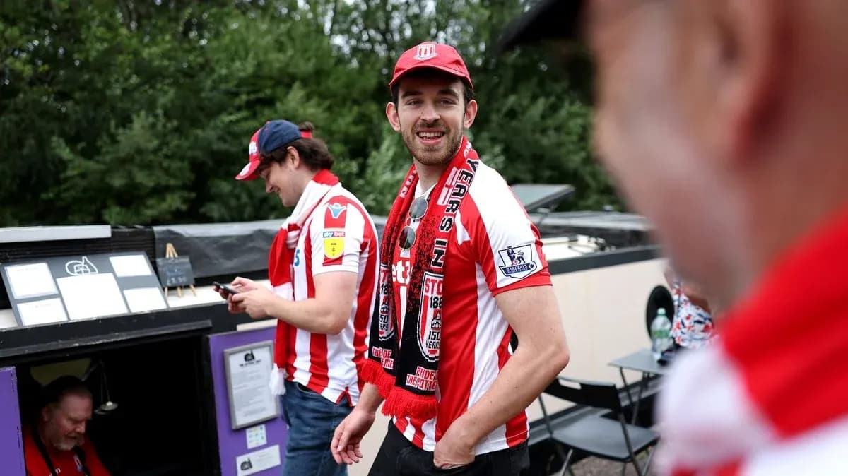 Fans wearing Stoke City jerseys at event Fans wearing Stoke City jerseys at event