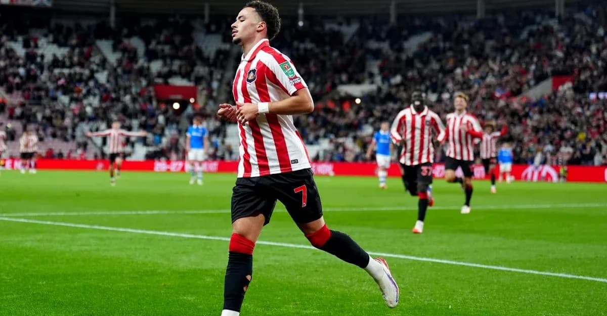 Player celebrating a goal during a match Player celebrating a goal during a match