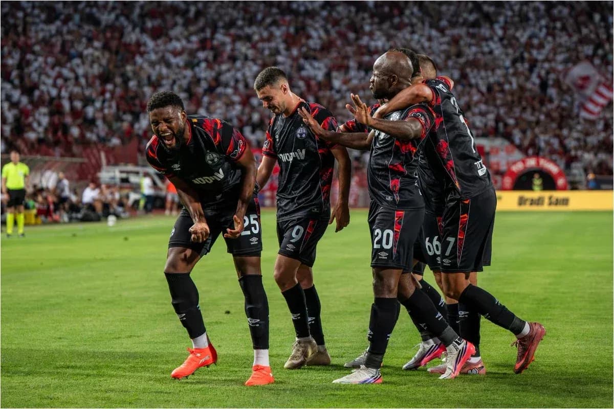 Players celebrating goal during UEFA Champions League match Players celebrating goal during UEFA Champions League match