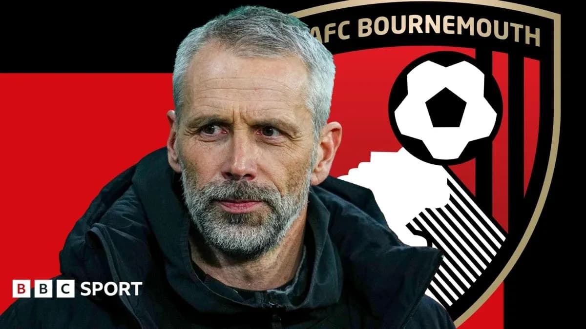 Manager in front of AFC Bournemouth logo backdrop Manager in front of AFC Bournemouth logo backdrop