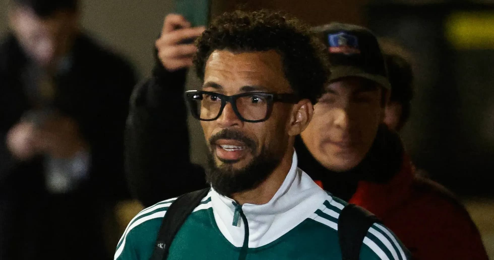 Player wearing glasses in team training gear Player wearing glasses in team training gear