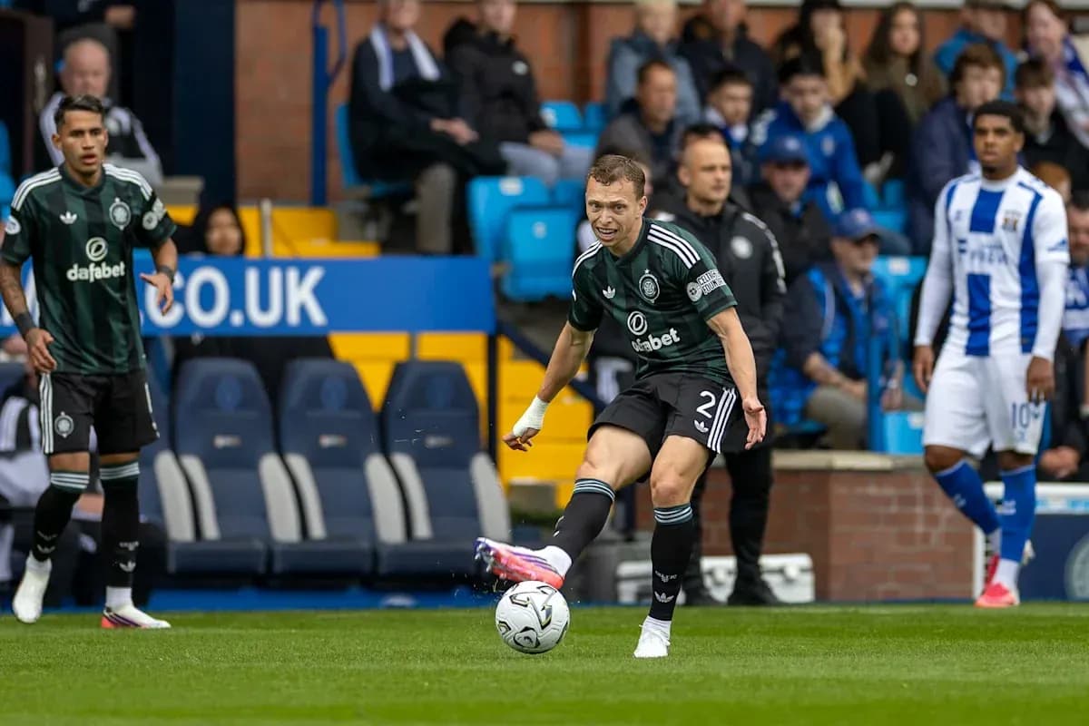 Player kicking the ball during a football match Player kicking the ball during a football match