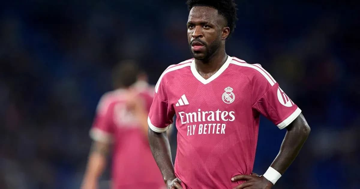 Player in pink Real Madrid jersey on the field Player in pink Real Madrid jersey on the field