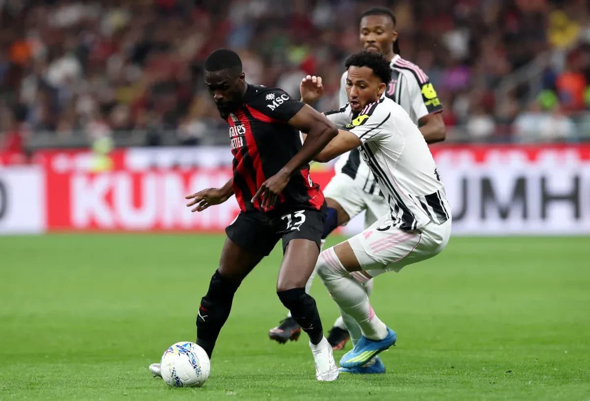 Player tackling during Juventus vs AC Milan match Player tackling during Juventus vs AC Milan match