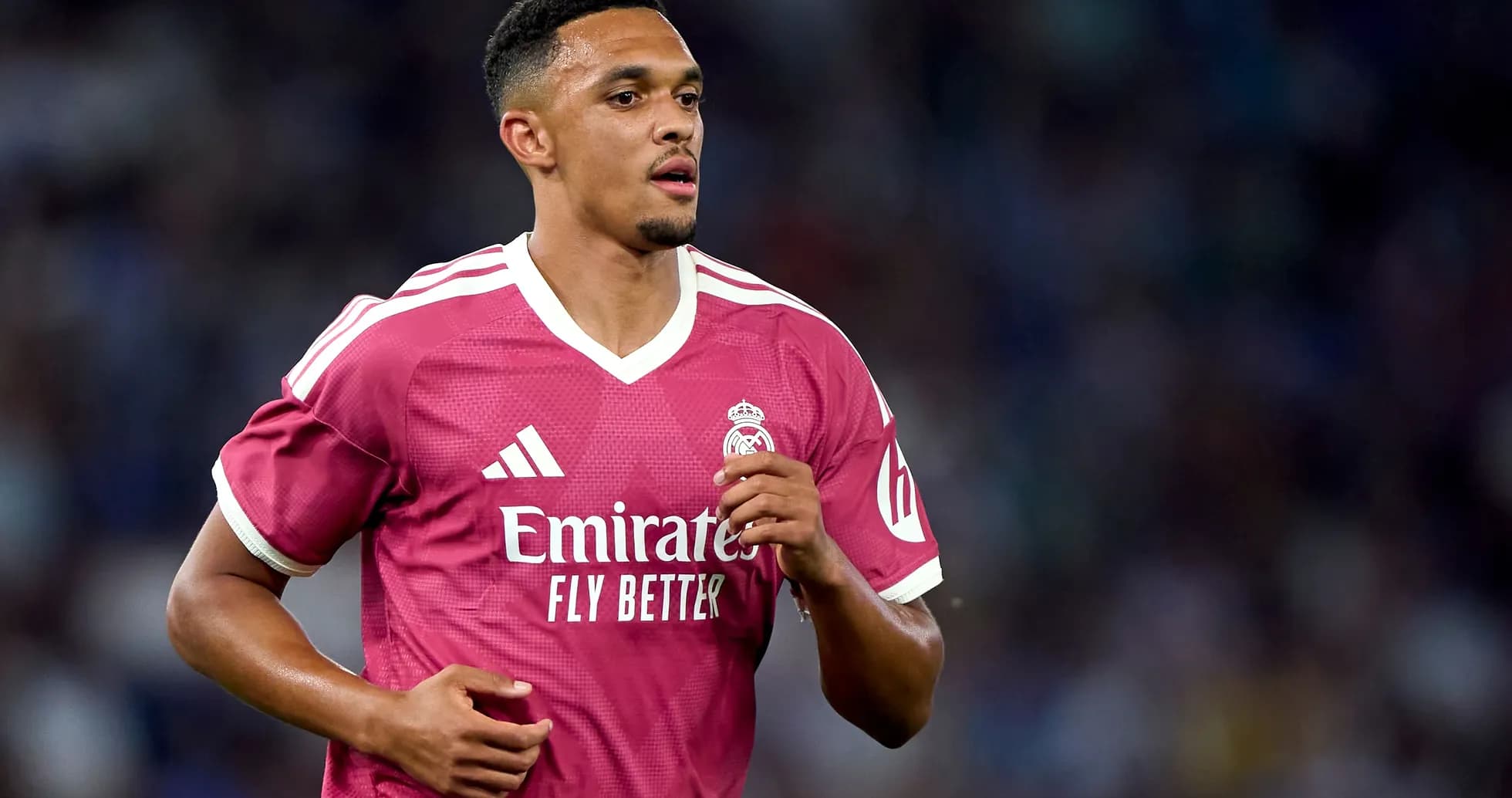 Player wearing pink Real Madrid jersey during match Player wearing pink Real Madrid jersey during match