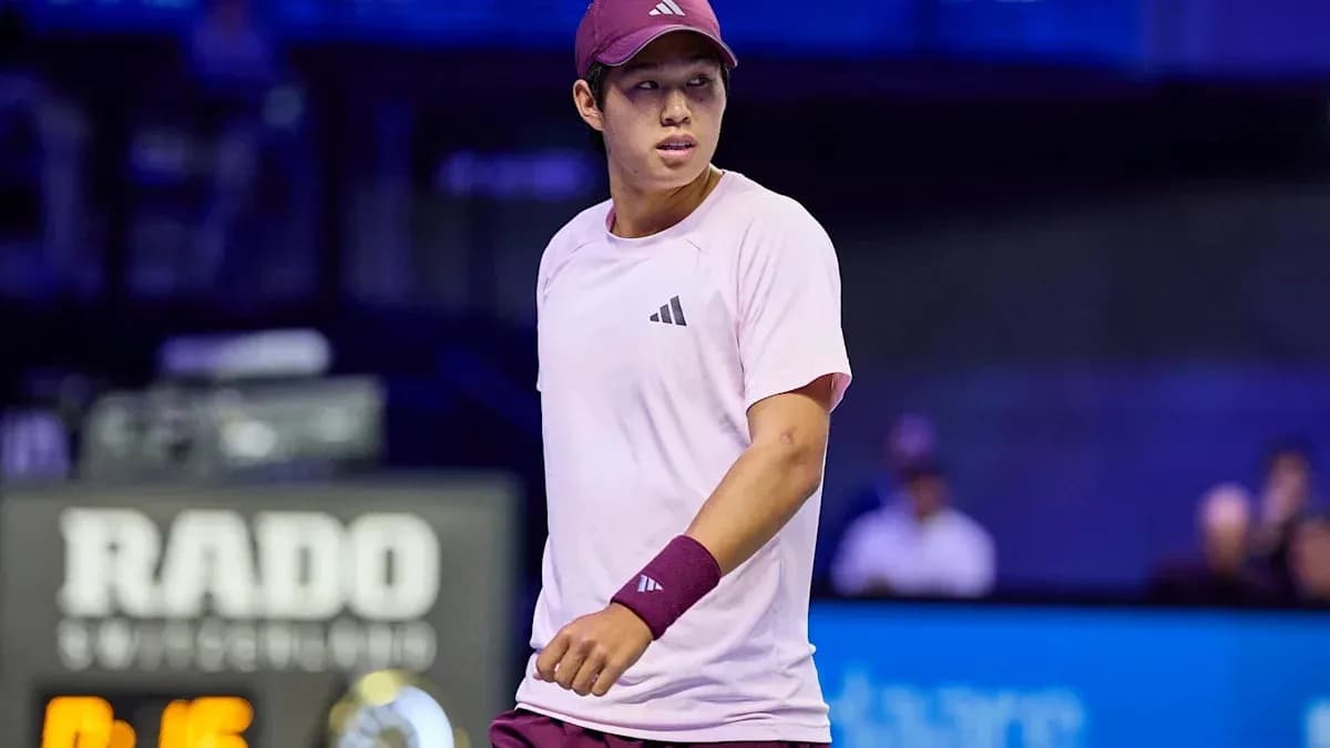 Tennis player in pink outfit during match Tennis player in pink outfit during match