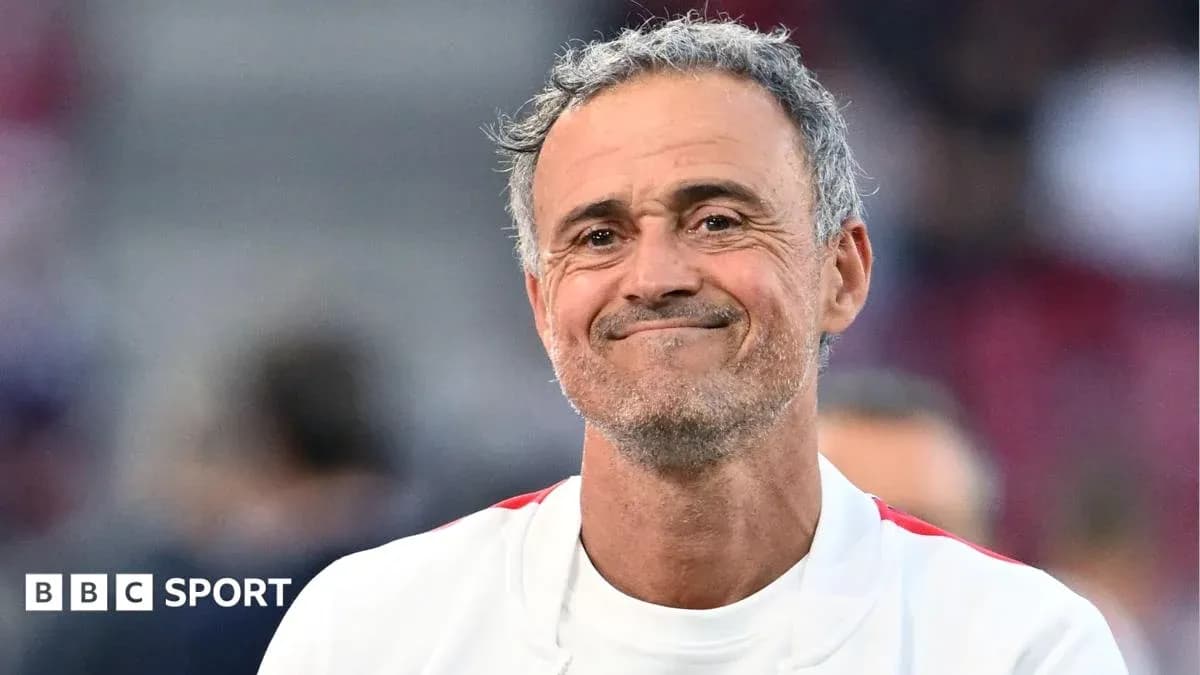 Coach smiling during post-match celebration Coach smiling during post-match celebration