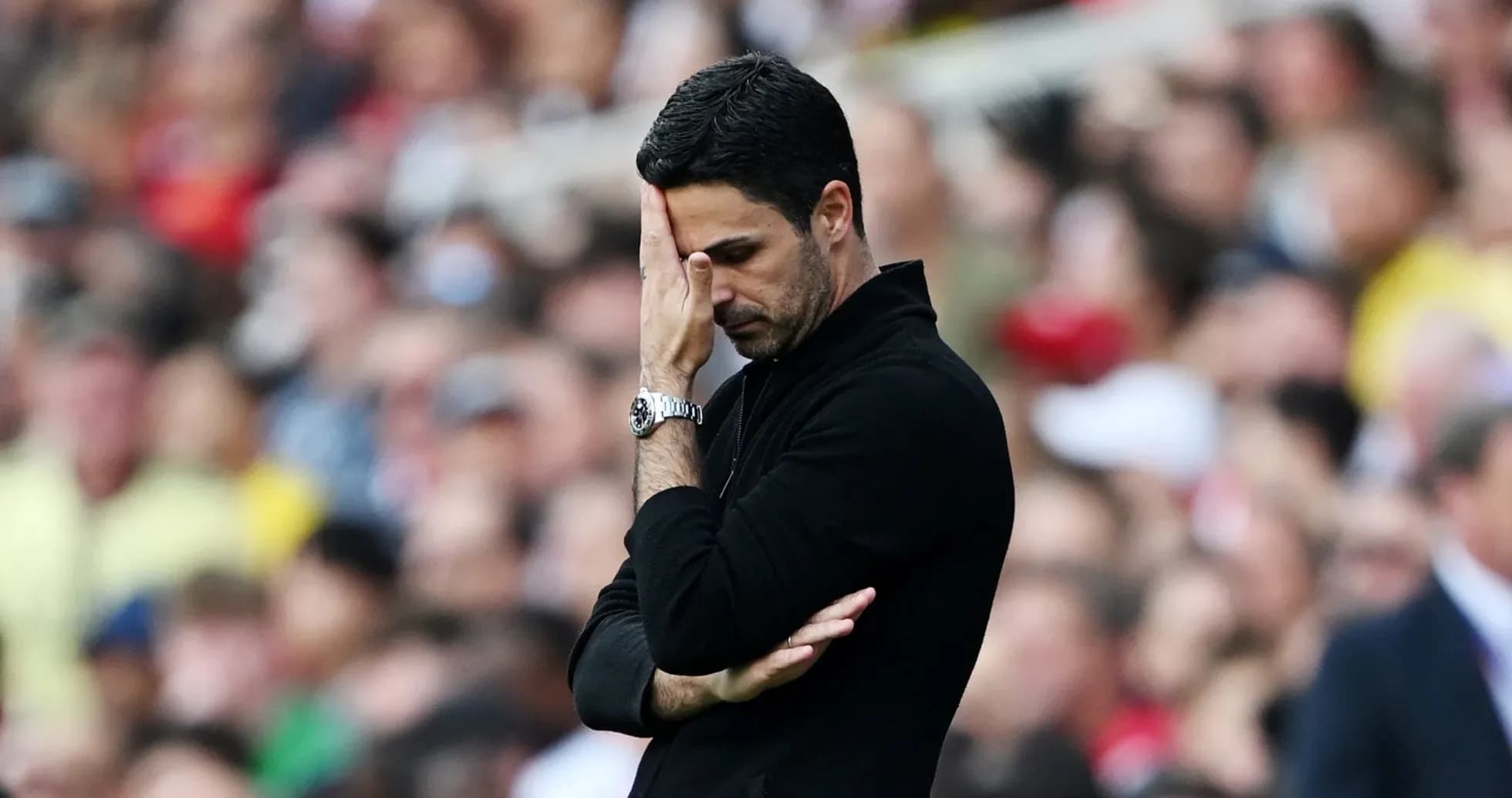 Coach with hand on forehead during match Coach with hand on forehead during match