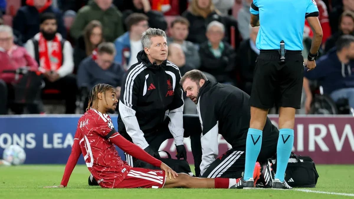 Player receiving medical attention on the field Player receiving medical attention on the field