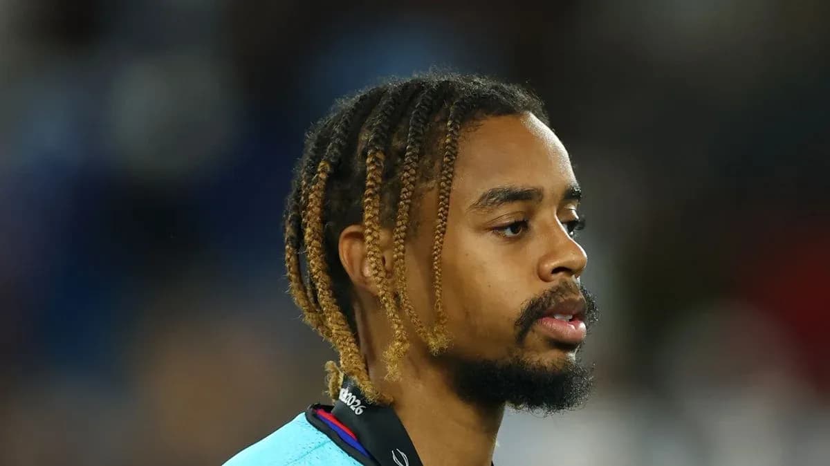 Player with braided hair during match warm-up Player with braided hair during match warm-up