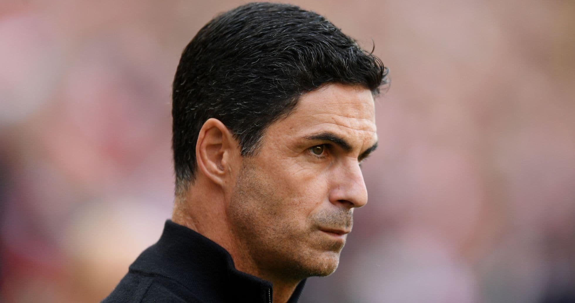 Manager focused during match at stadium Manager focused during match at stadium