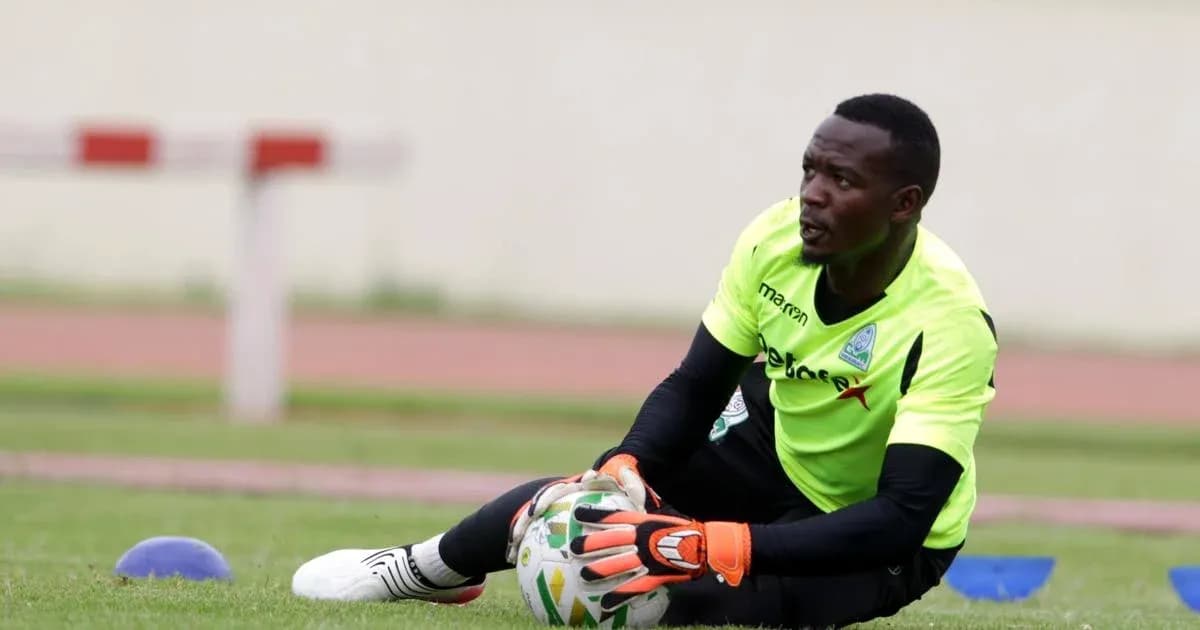 Goalkeeper training on the pitch with ball Goalkeeper training on the pitch with ball