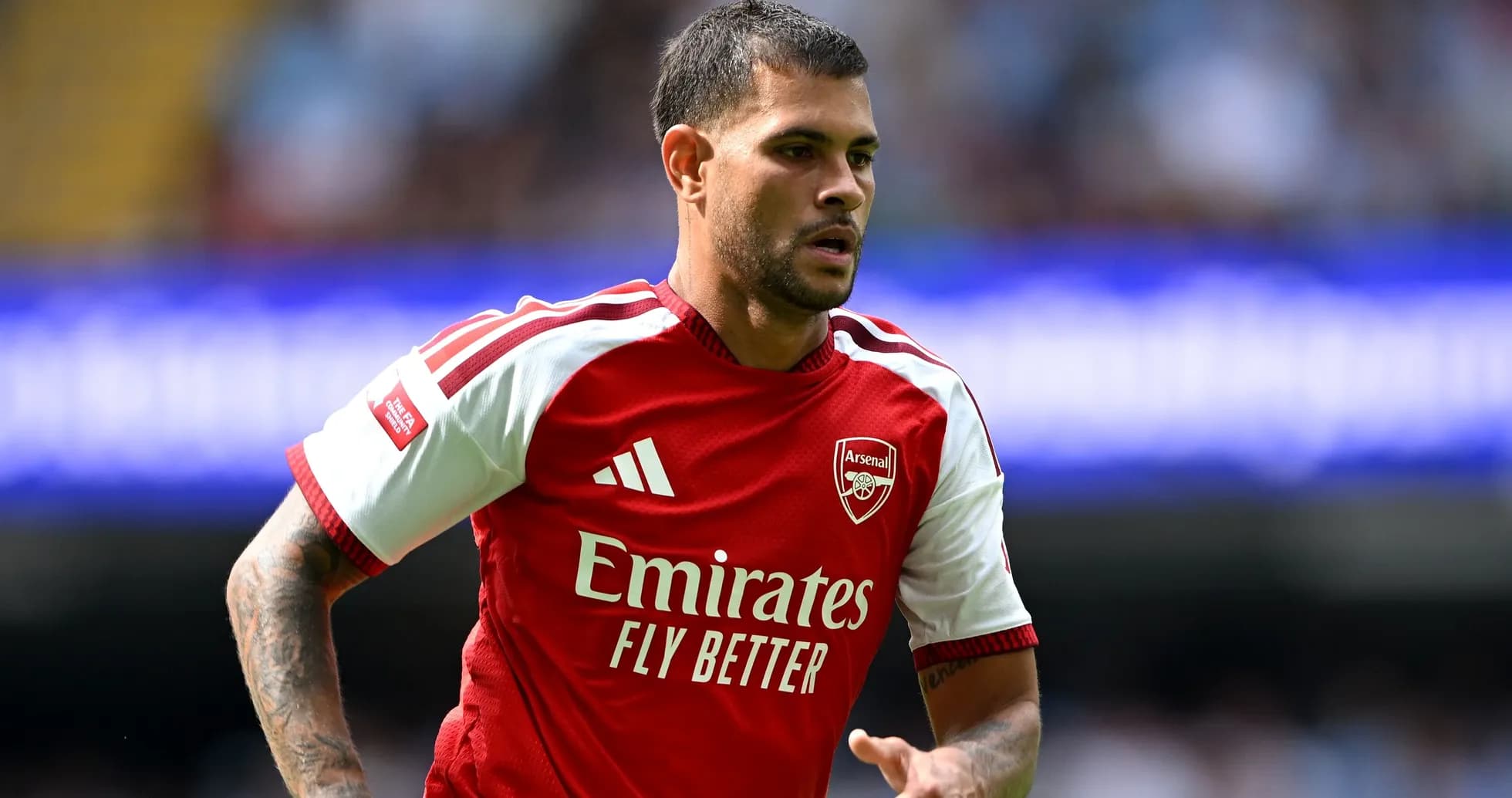Player wearing Arsenal jersey during match action Player wearing Arsenal jersey during match action