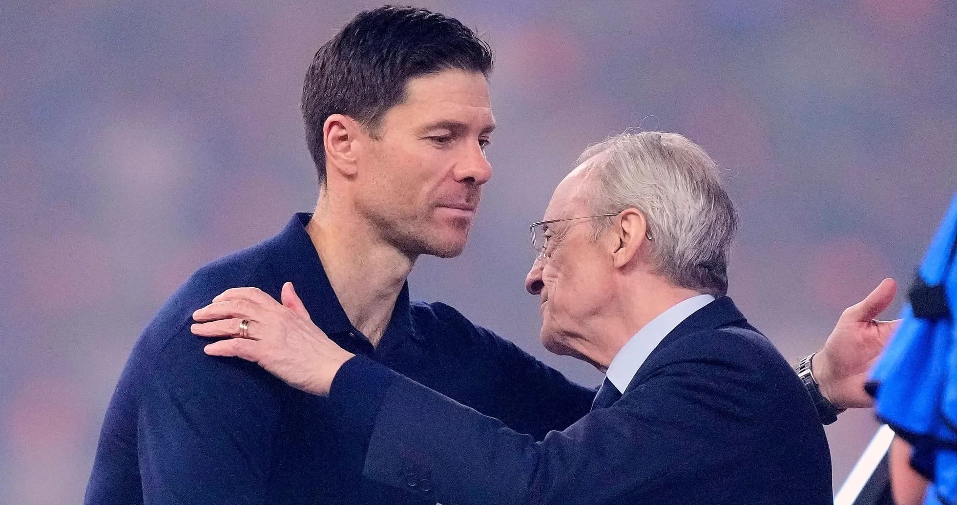 Two men embracing at a sports event Two men embracing at a sports event