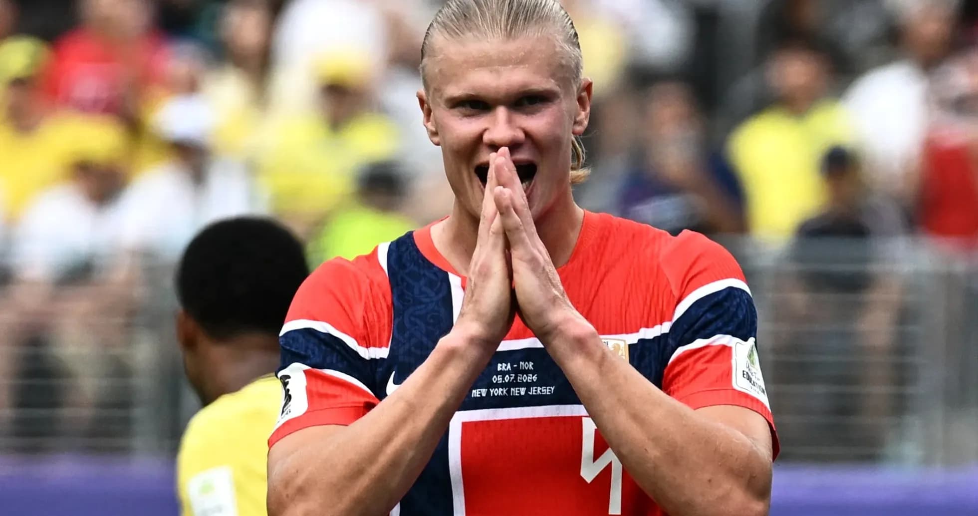 Player celebrating during a match in stadium Player celebrating during a match in stadium