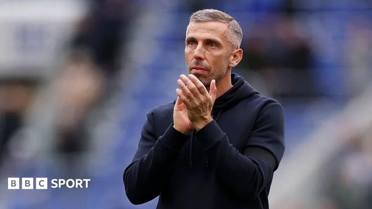 Coach applauding fans during a match Coach applauding fans during a match