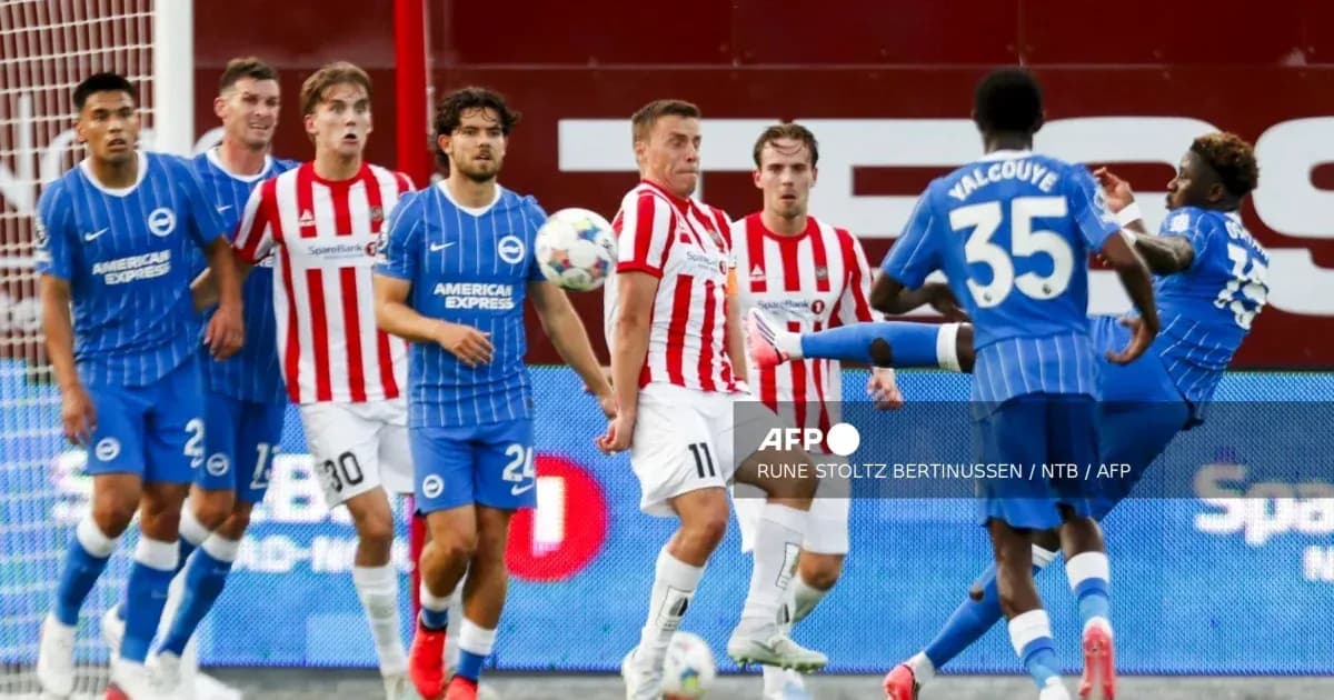 Players in action during a football match Players in action during a football match
