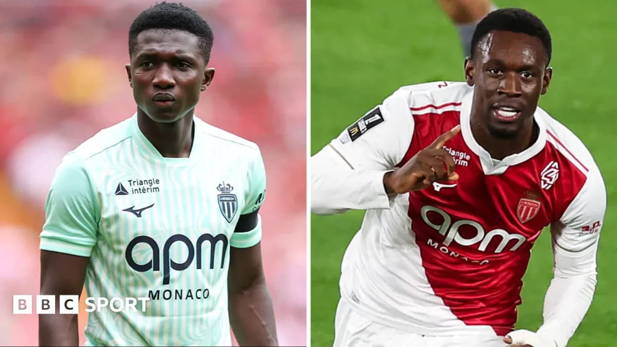 Two AS Monaco players in different kits during match Two AS Monaco players in different kits during match