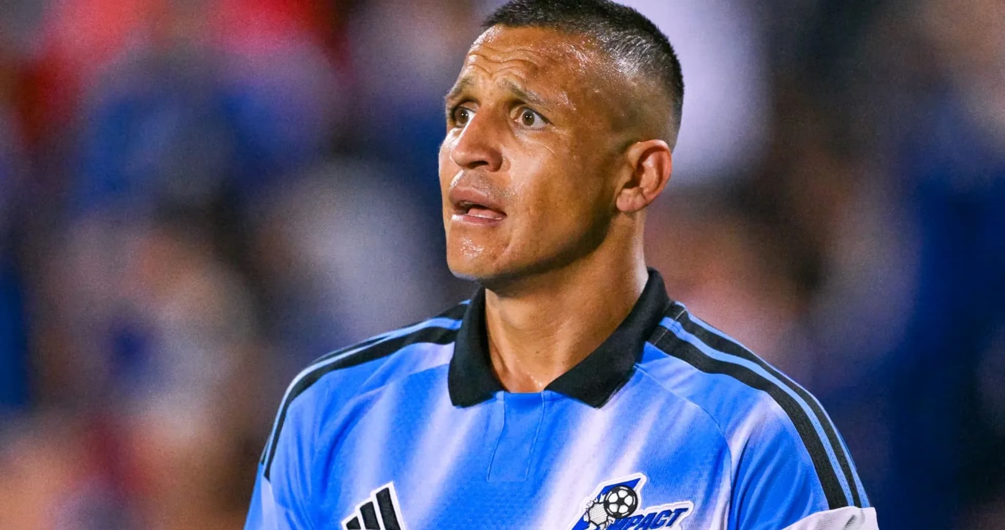 Player wearing blue jersey during a match Player wearing blue jersey during a match
