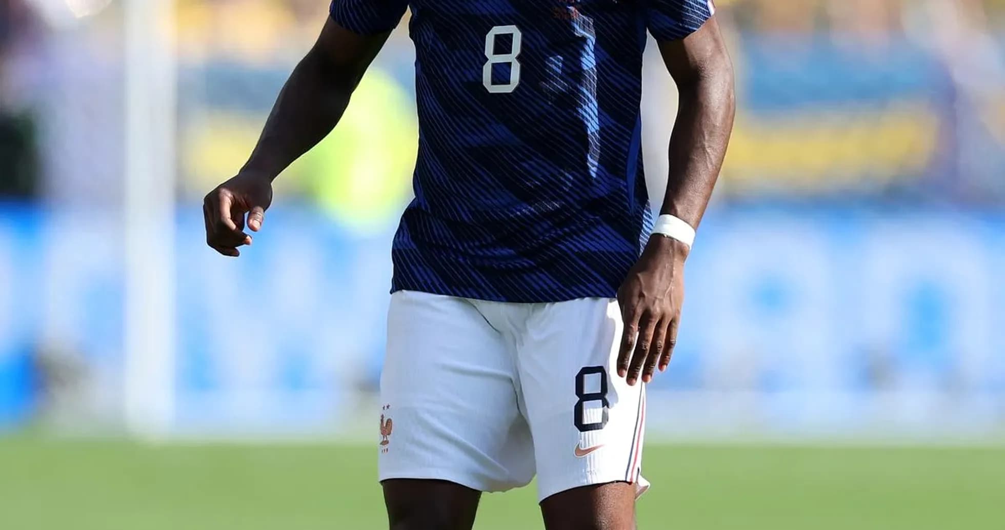 Player in blue France kit with ball on field Player in blue France kit with ball on field