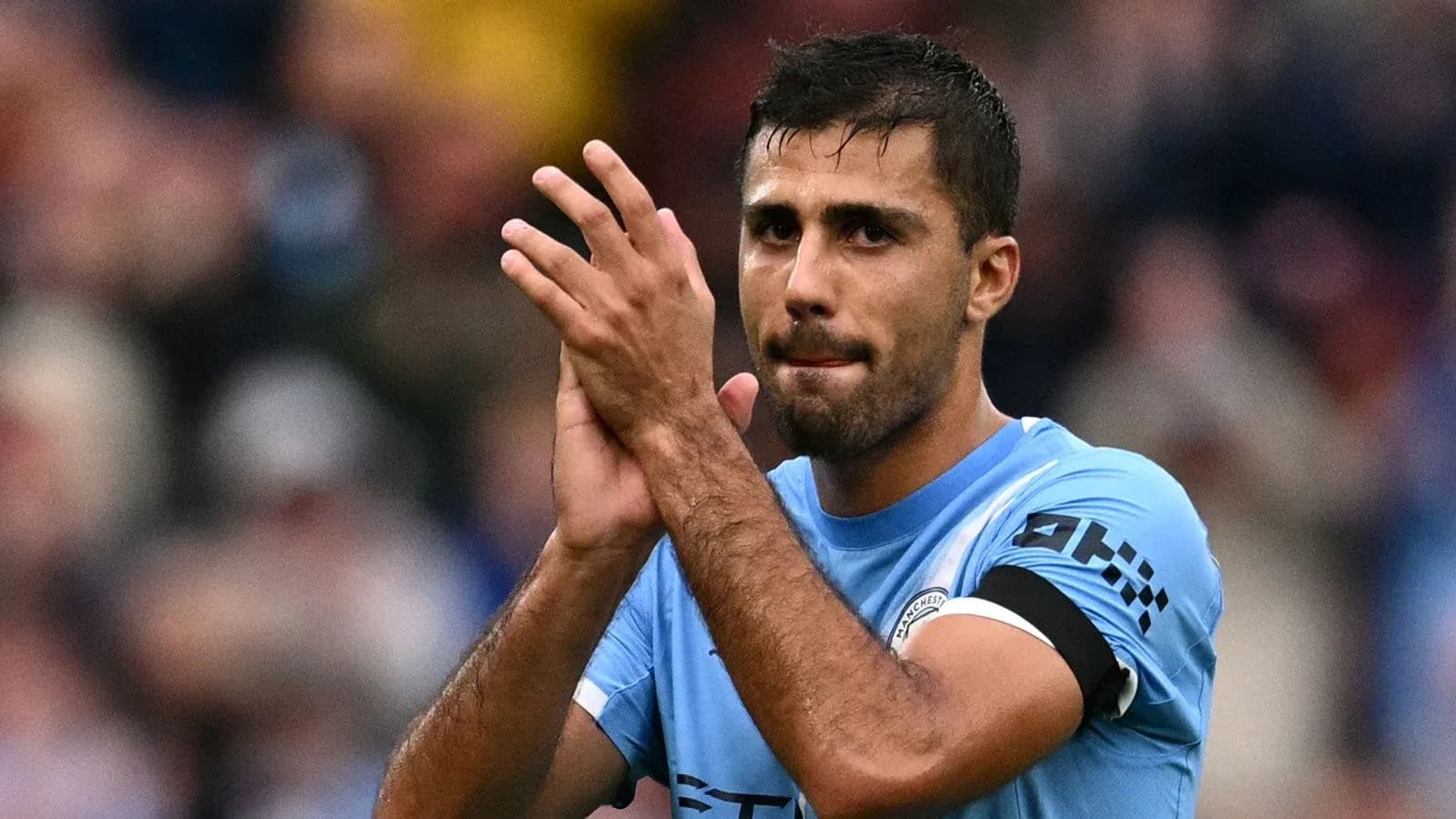 Player applauding fans after the match Player applauding fans after the match