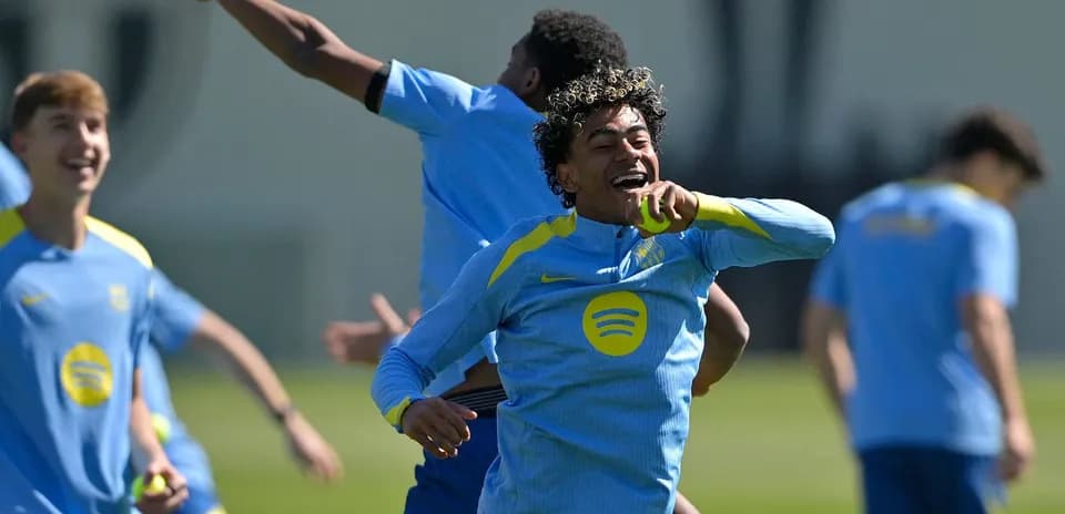 Players celebrating during a training session Players celebrating during a training session