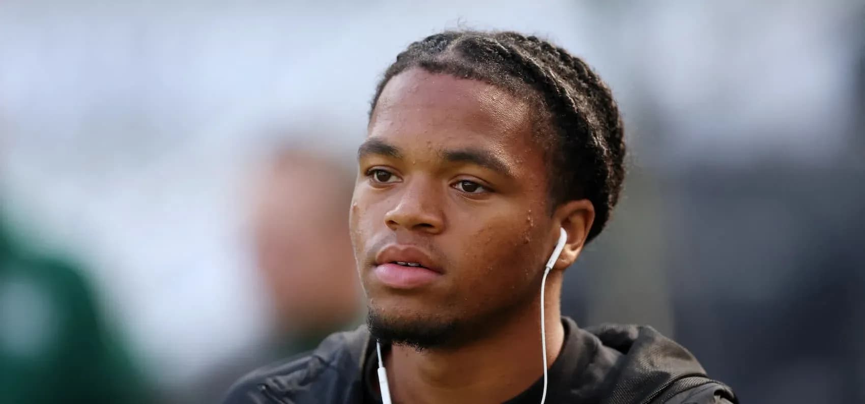 Player wearing headphones before the match Player wearing headphones before the match