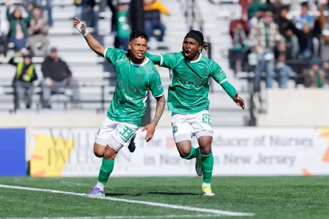 NY Cosmos players celebrating a goal NY Cosmos players celebrating a goal