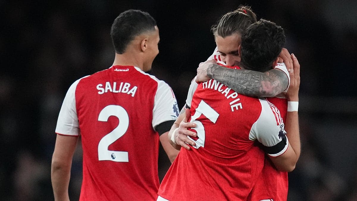 Arsenal players celebrating a goal during match Arsenal players celebrating a goal during match
