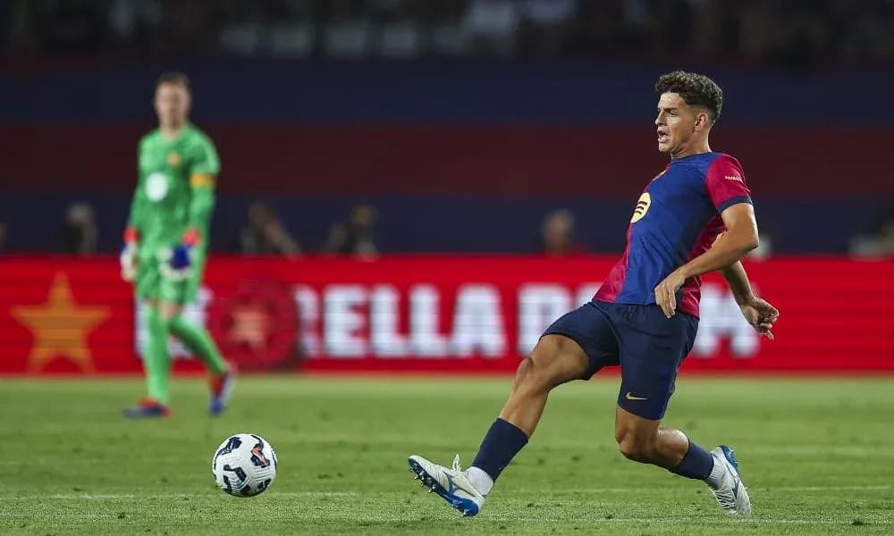 Player kicking ball during football match Player kicking ball during football match