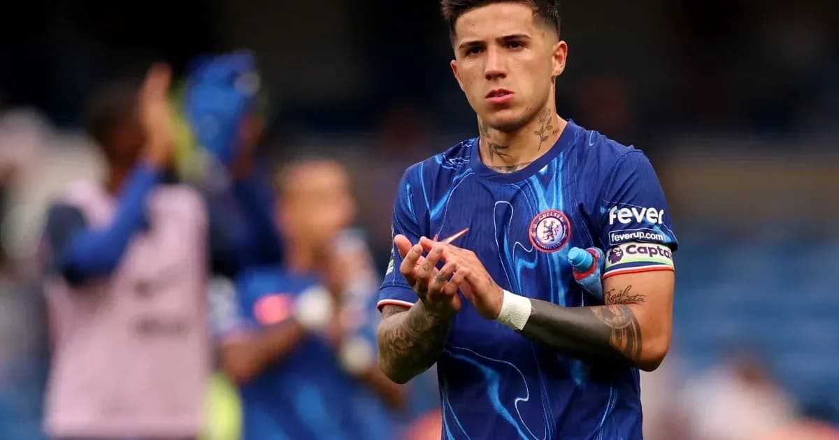 Player applauding fans in Chelsea kit on pitch Player applauding fans in Chelsea kit on pitch
