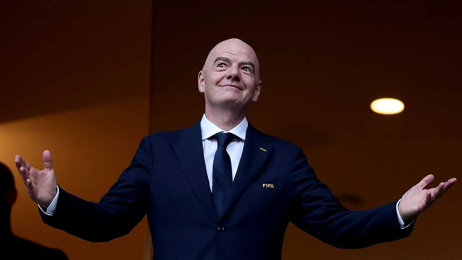 FIFA president gesturing during an event FIFA president gesturing during an event