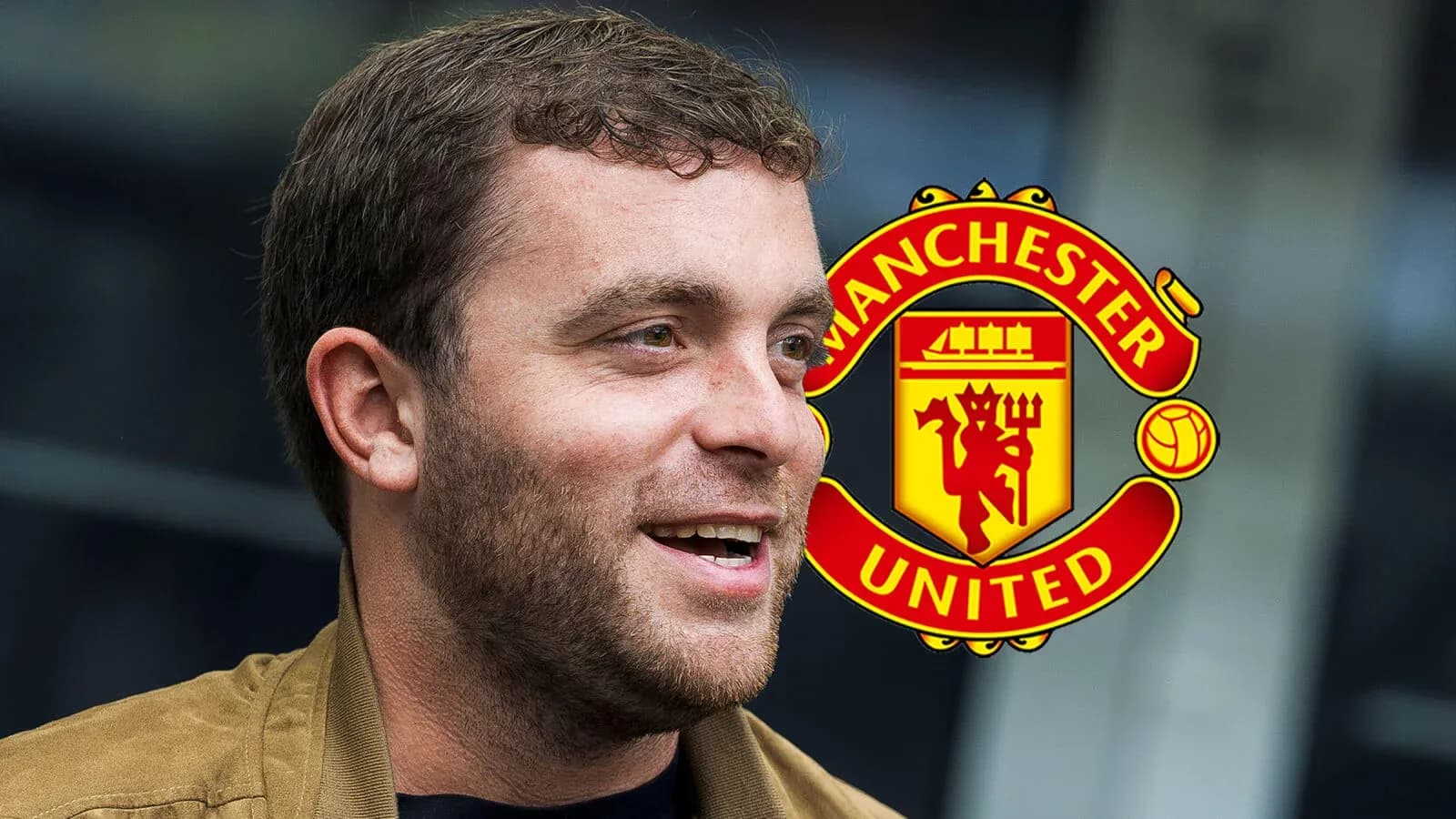 Man speaking with Manchester United logo in background Man speaking with Manchester United logo in background