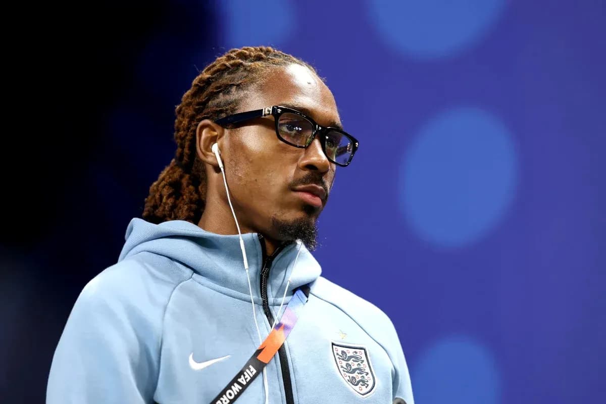 Player wearing glasses and earphones, focused Player wearing glasses and earphones, focused