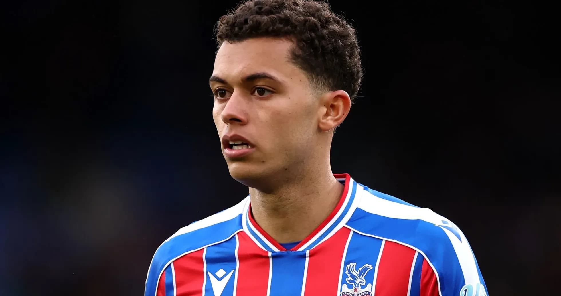 Football player wearing Crystal Palace jersey Football player wearing Crystal Palace jersey