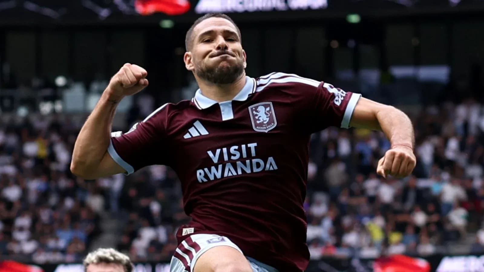 Player celebrating after scoring a goal for Aston Villa Player celebrating after scoring a goal for Aston Villa