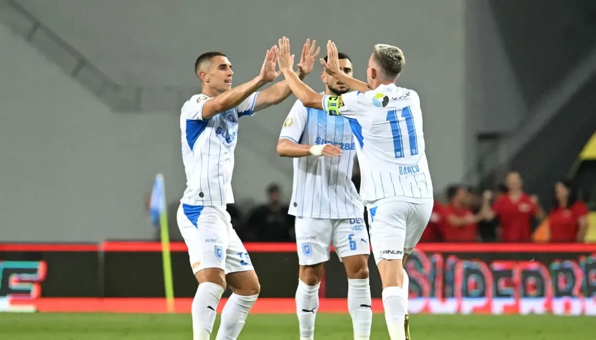 Players celebrating a goal during UEFA match Players celebrating a goal during UEFA match