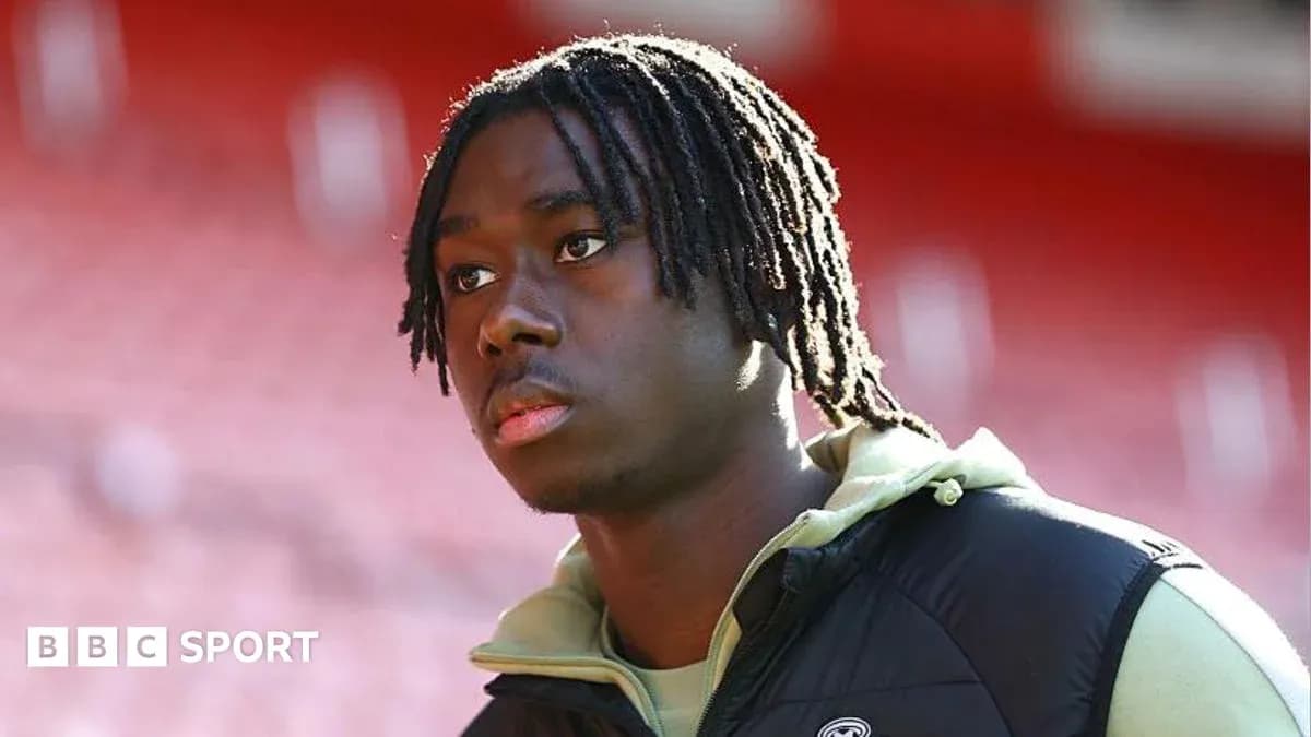 Player walking in stadium before match Player walking in stadium before match