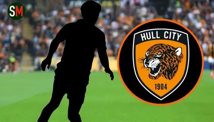 Silhouette of player with Hull City logo background Silhouette of player with Hull City logo background