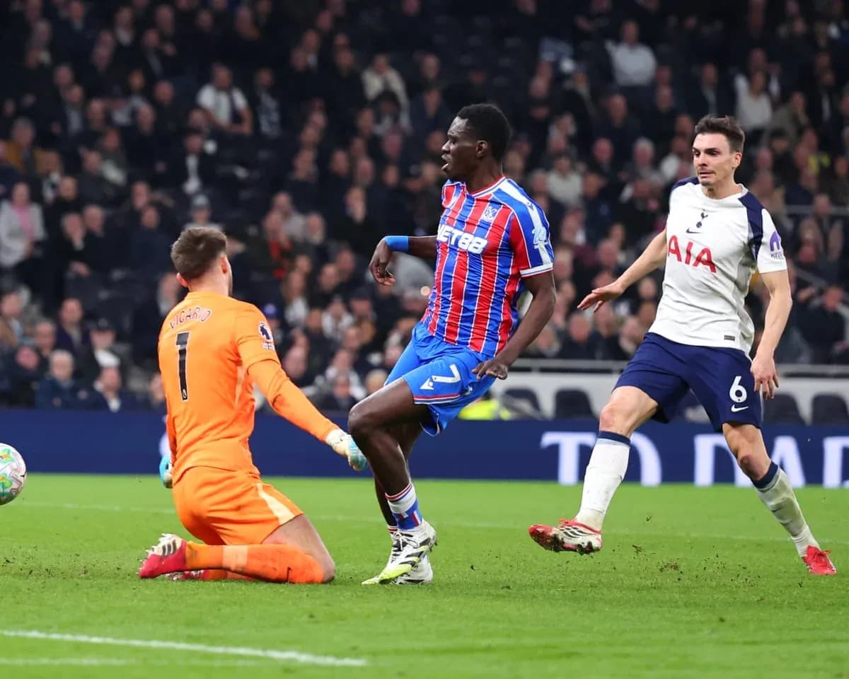 Crystal Palace player challenged by Tottenham goalkeeper Crystal Palace player challenged by Tottenham goalkeeper