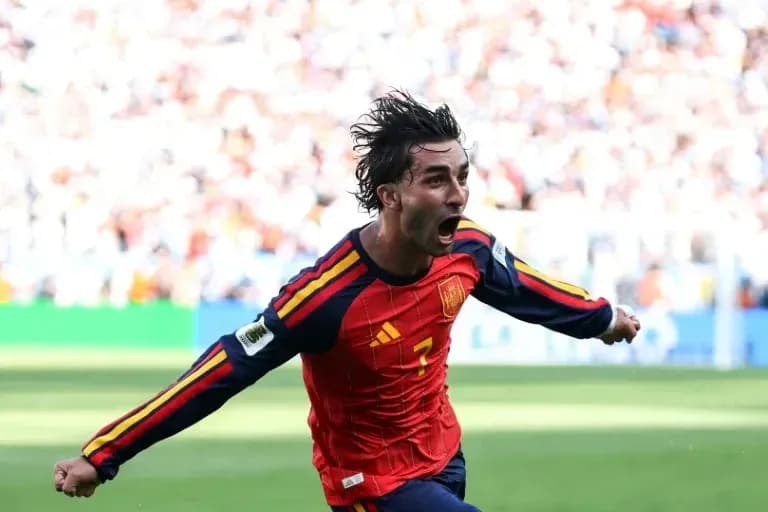 Player celebrating a goal during a match Player celebrating a goal during a match