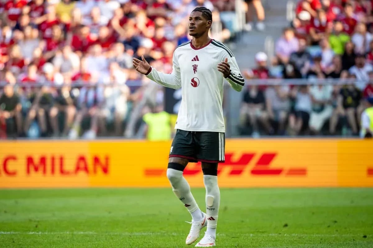 Player gesturing during match with fans in background Player gesturing during match with fans in background