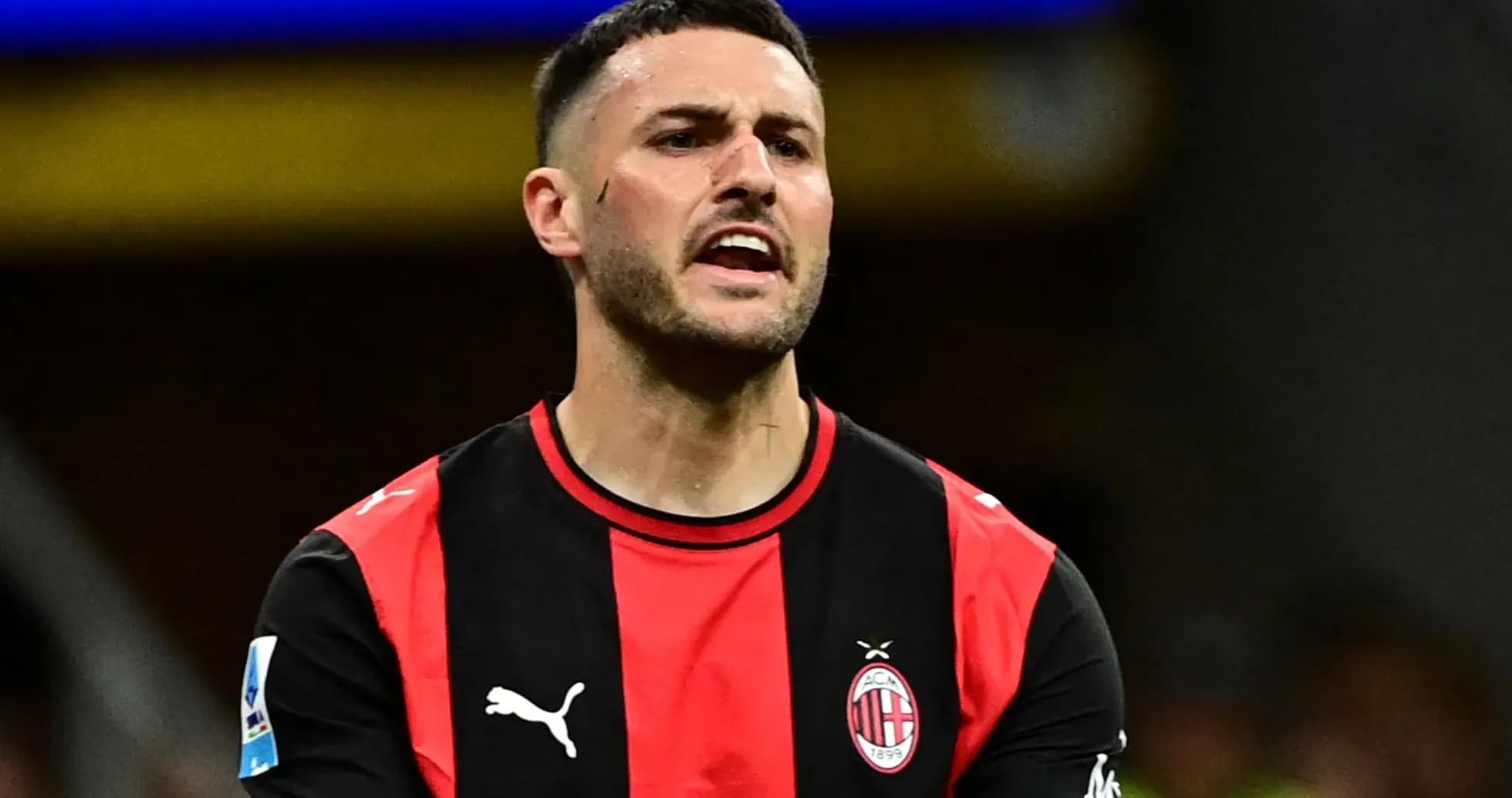 Player in AC Milan jersey reacting during match Player in AC Milan jersey reacting during match