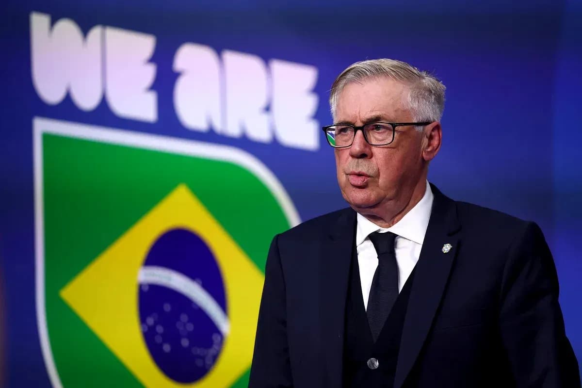 Man speaking in front of Brazil football logo Man speaking in front of Brazil football logo