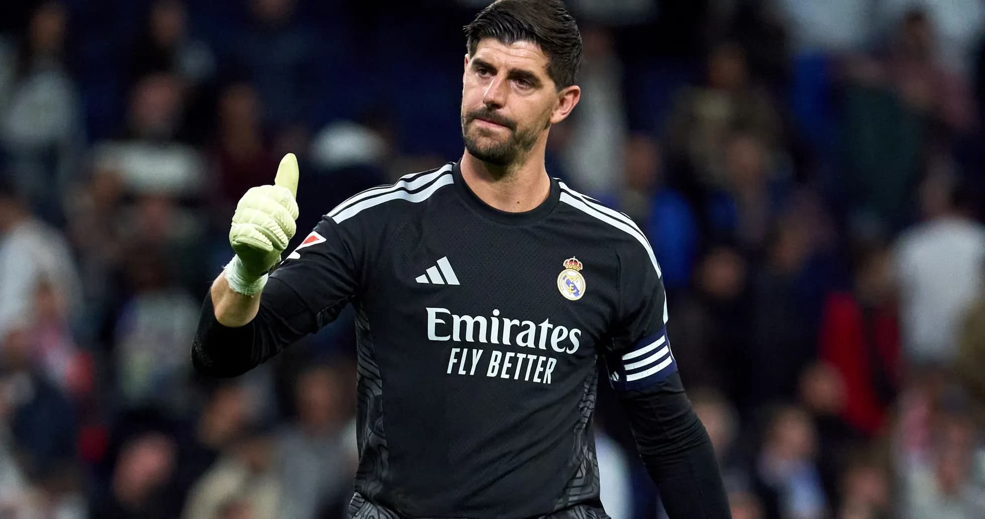 Goalkeeper gesturing with thumbs up during match Goalkeeper gesturing with thumbs up during match