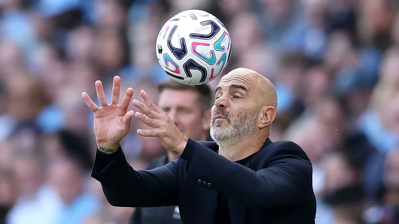 Coach attempting to catch ball during match Coach attempting to catch ball during match