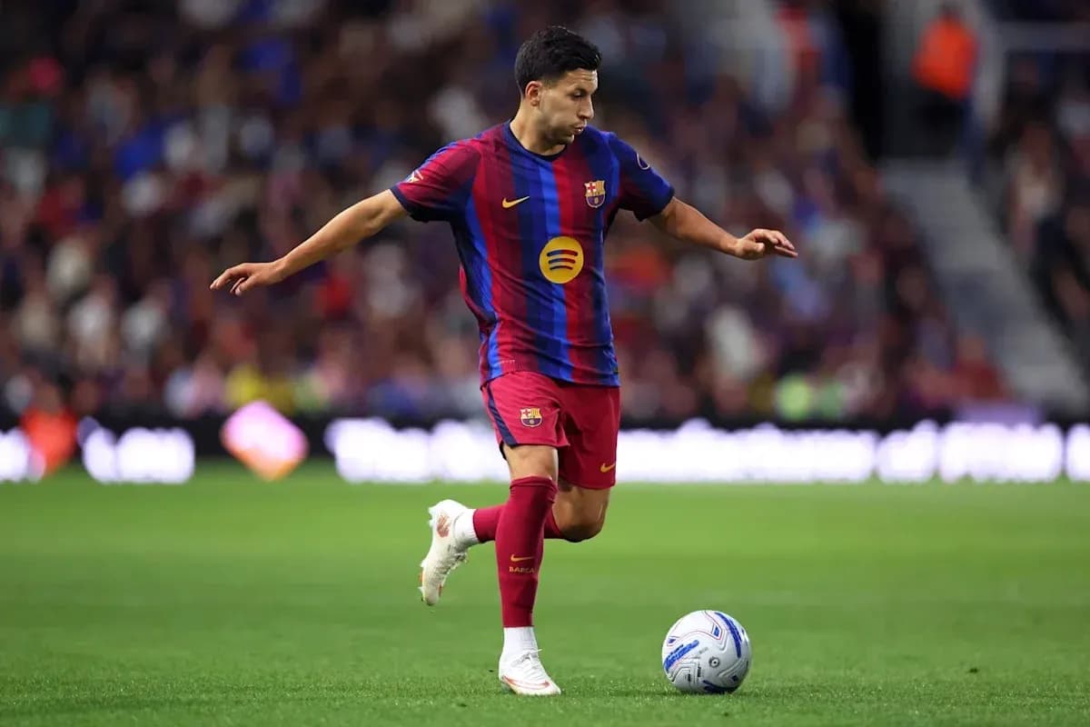 Player dribbling the ball during a match Player dribbling the ball during a match