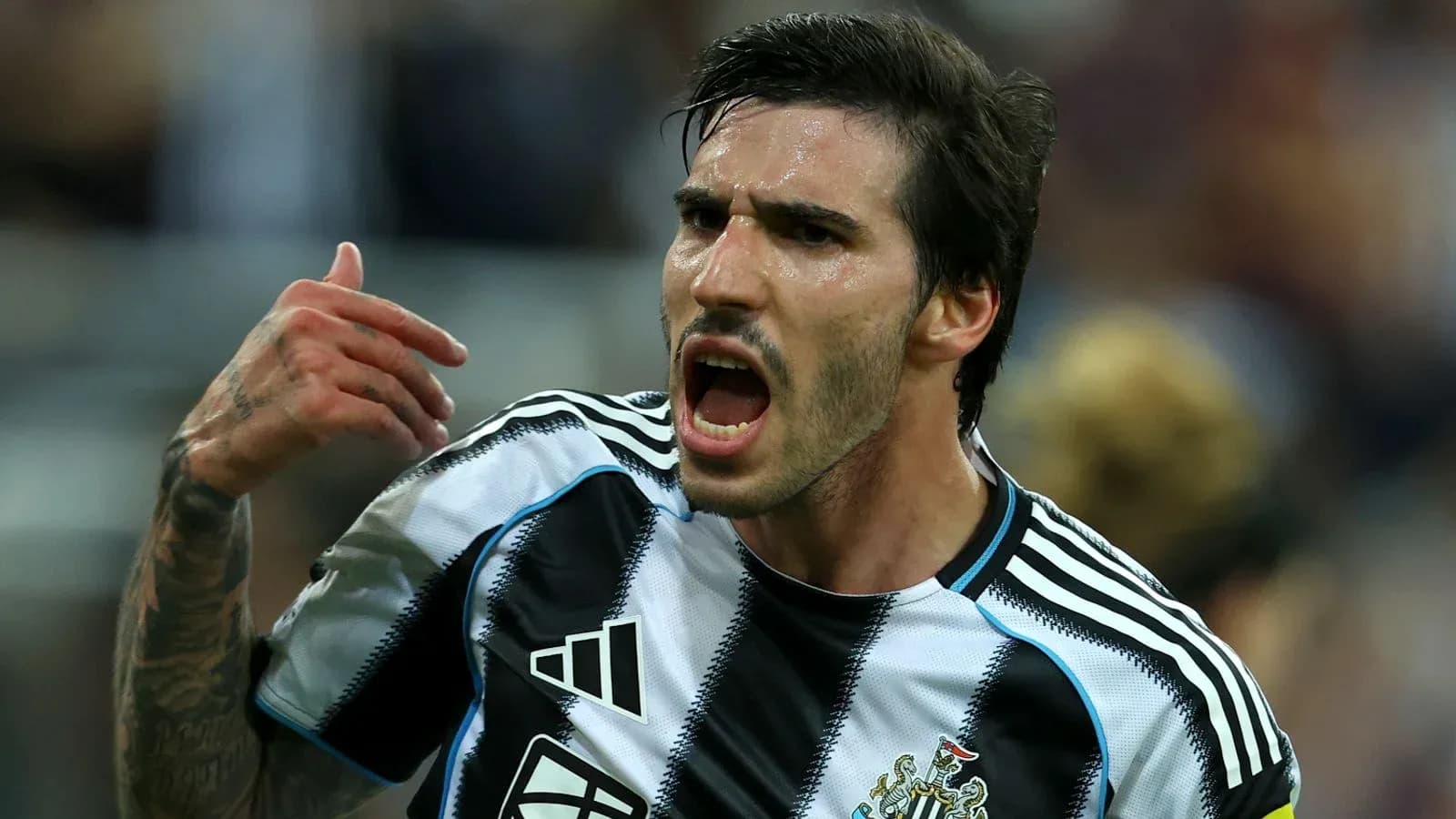 Player celebrating passionately on the field Player celebrating passionately on the field